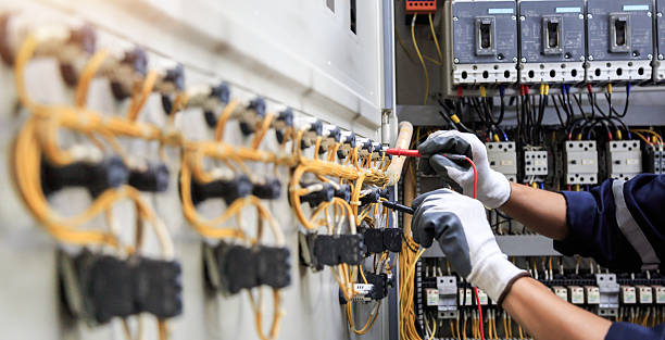 Professional Electrician technician working in South Bay, FL
